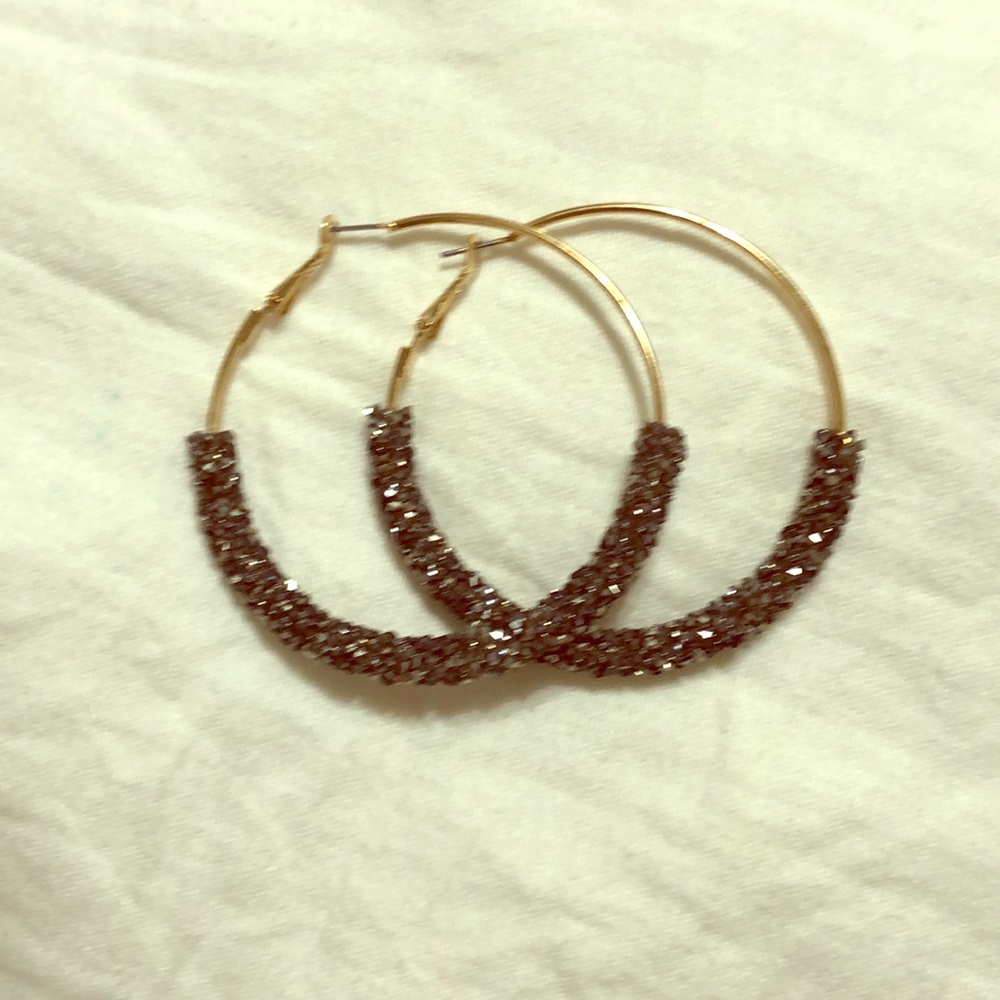 Hoop earrings with rhinestones